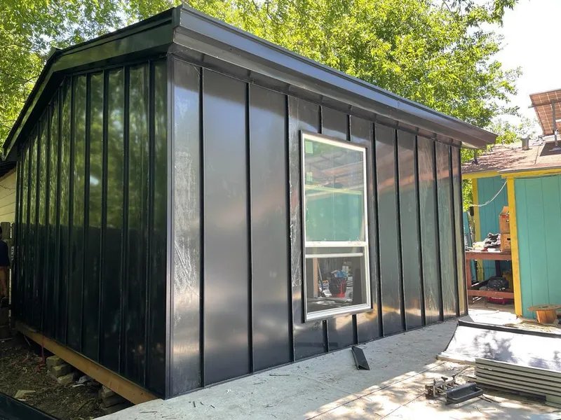 Black standing seam metal wall panels for Roof Inspection in Rio Pinar